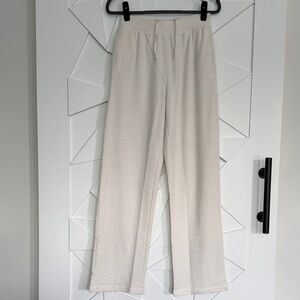 ALO Yoga Relaxed Wide-Leg Lounge Pants in Cream